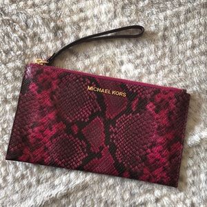 Pink snake skin Michael Kors wrist purse/ clutch